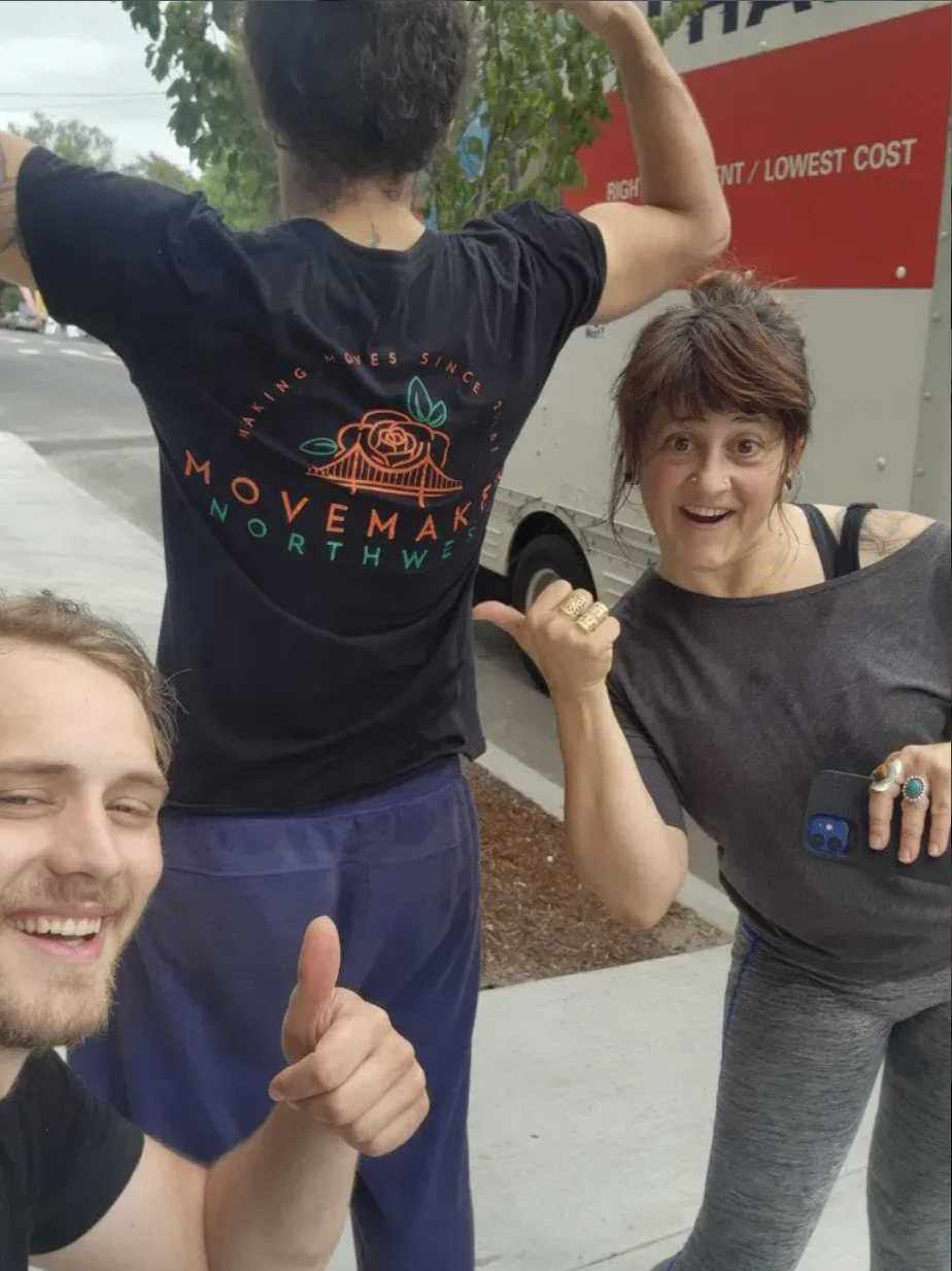 MoveMaker Northwest team with a happy customer and U-Haul truck